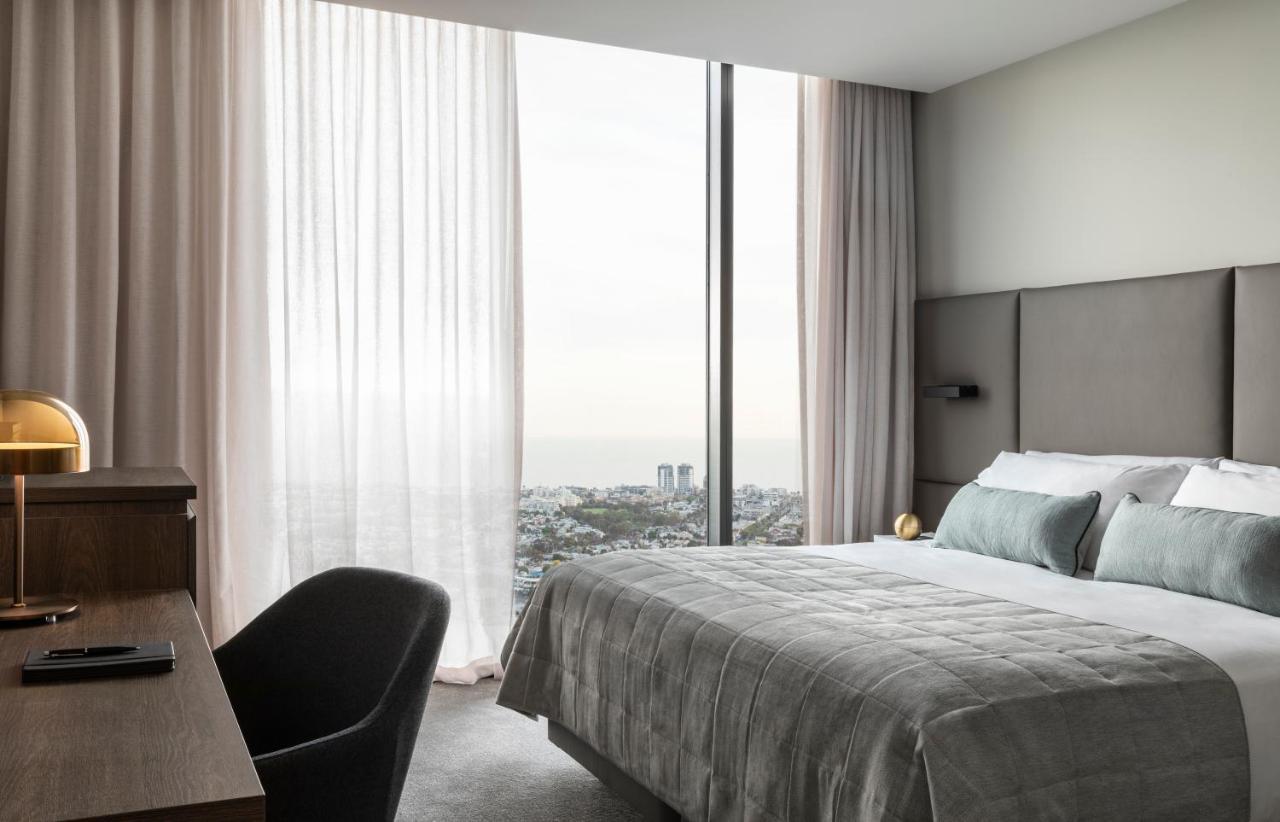 Oakwood Premier Melbourne Aparthotel Kültér fotó A bedroom at the hotel